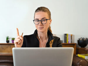 young business woman student teacher tutor coach psychologist headphone, conference calling on laptop computer talk by webcam learn teach in online chat, distance webinar online teaching concept