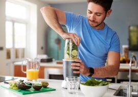 man-making-healthy-juice-drink-with-fresh-ingredie-2022-02-08-22-39-24-utc